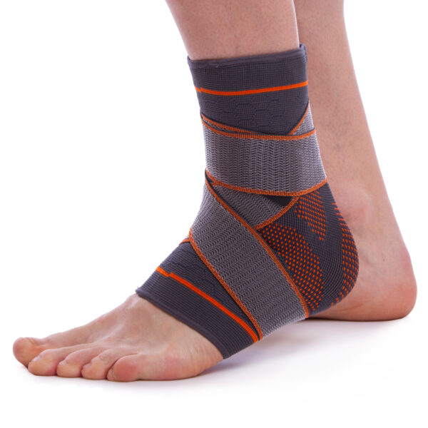 Бандаж на голеностоп эластичный с фиксирующим ремнем (фиксатор лодыжки) SIBOTE размер S-XL 1шт серый-оранжевый